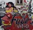 Picture of a mural honoring fado music, which travelers on our off-the-beaten-path tour to Portugal will hear for themselves. 