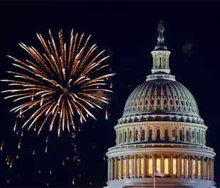 the capitol building in DC with fireworks