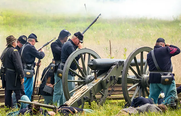 Civil war reenactors on battlefield