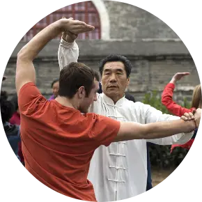 A student gets a tai chi lesson on a Language and Culture tour in Beijing 